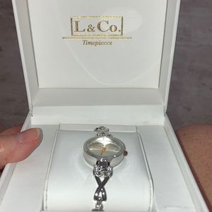 L & co. Timepiece watch.  Never worn.